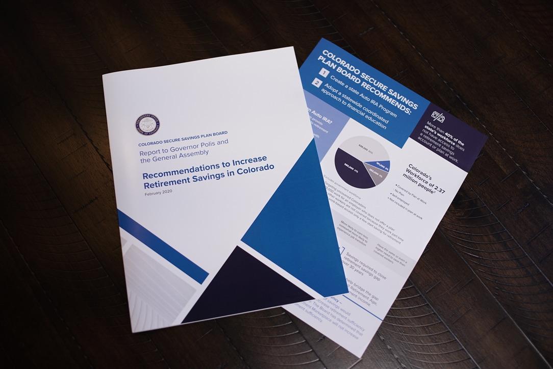 A photo of the Secure Savings Report lying on a table